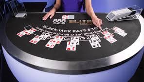 Filipino player accessing phjoy app Casino on a mobile phone showing live baccarat table